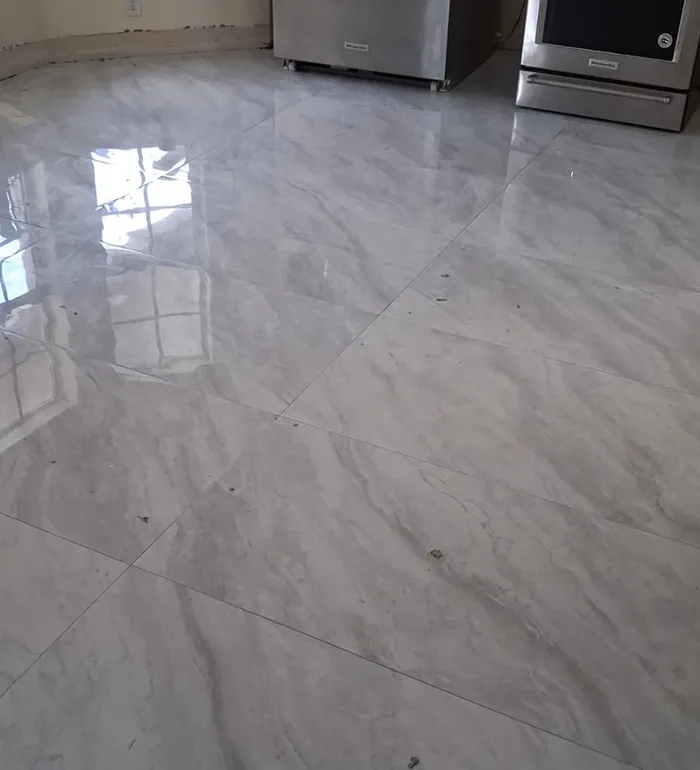 Polished porcelain floor installed by Butler